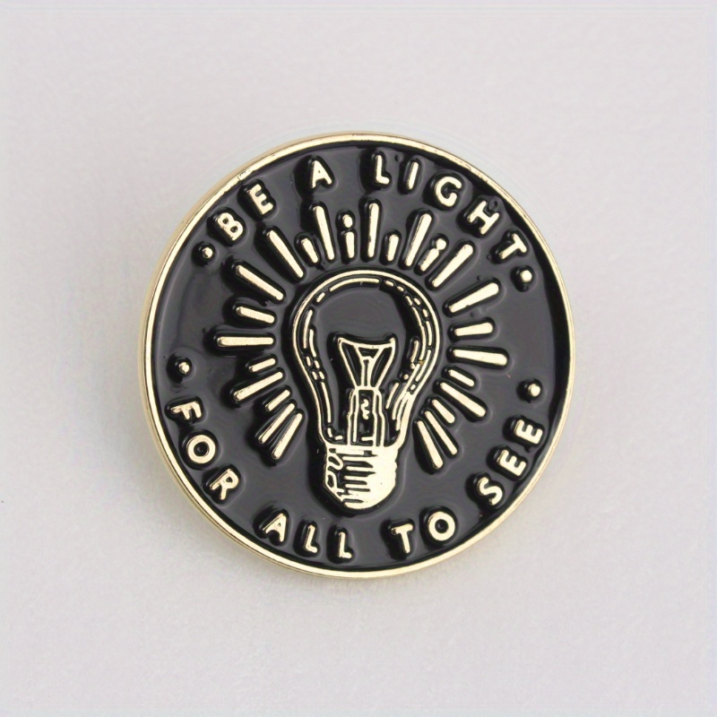 "be " Inspirational Enamel Pin, This Round Badge Showcases A Bulb Design, Symbolizing The Encouragement For Individuals To Let Their Shine. With A Yet Meaningful Design