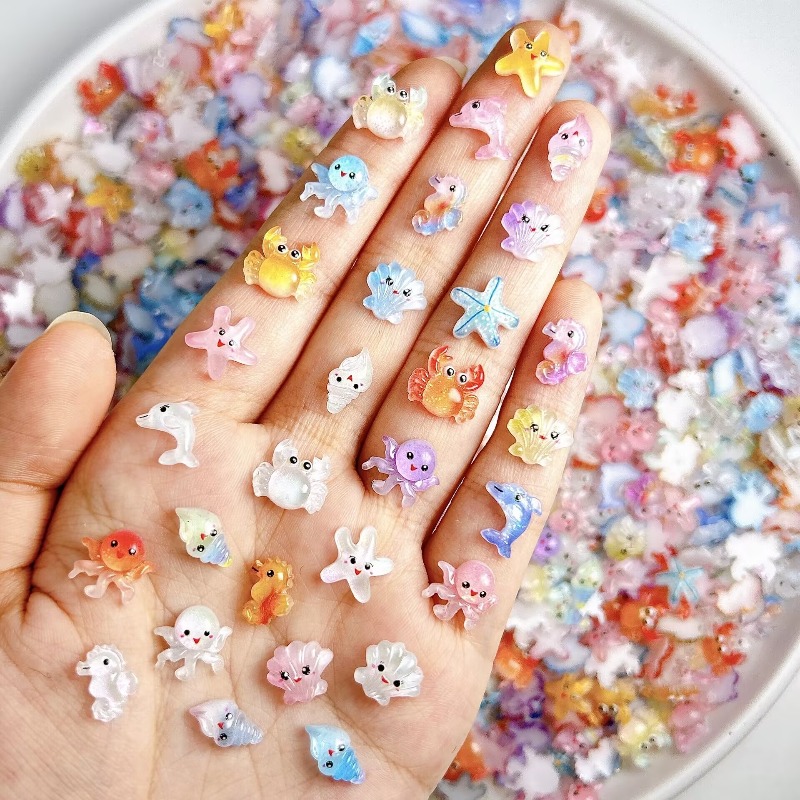 50 110pcs cute resin mini   theme random color octopus dolphin   crab seahorse shell conch decoration additions suitable for nail art   crafts