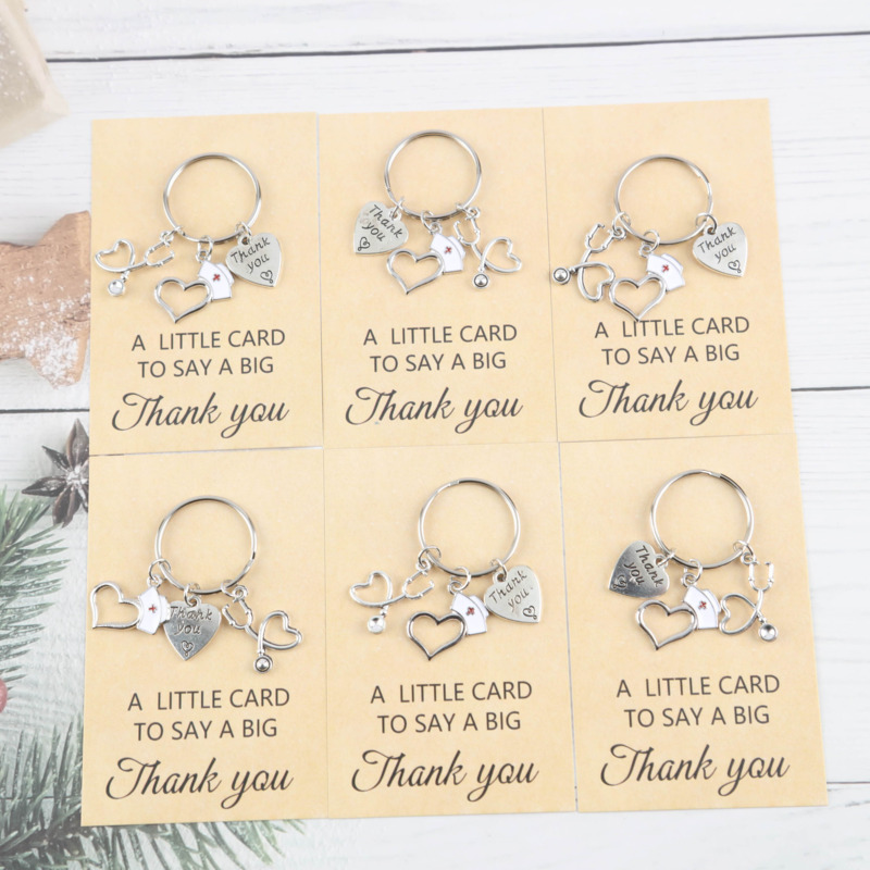 E-shop Ein Set aus 6 Schlüsselanhängern für das Personal, begleitet von einer Dankeskarte, dient als positives Unterstützungsgeschenk für Ärzte,