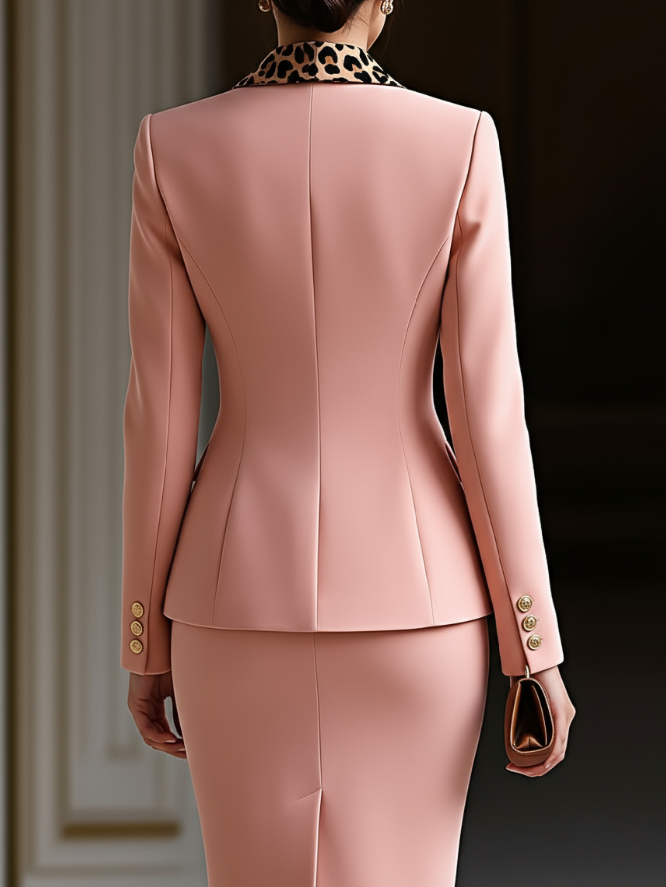 Two-piece pink leopard print blazer and pencil skirt ensemble