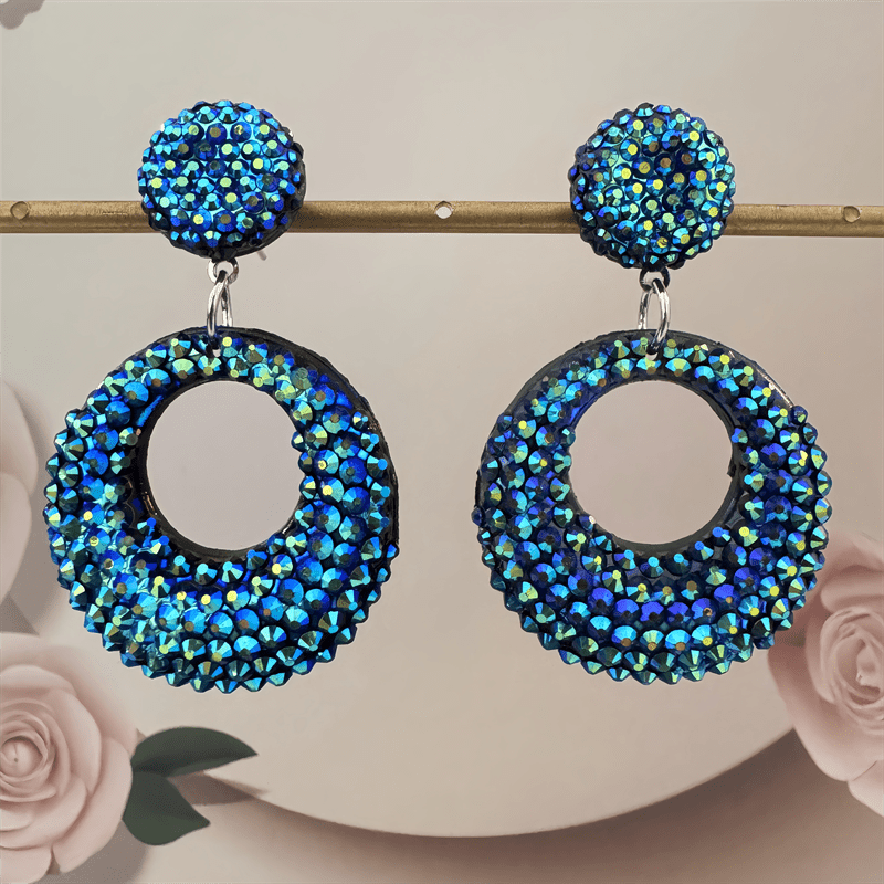 Image of Hollow Circular Resin Pendant Earrings Have A , Elegant, And Fashionable Style, Making Them For Women To Wear Or Give Gifts All Year Round