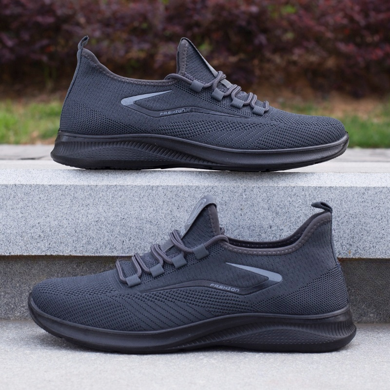 mens everyday sneakers   breathable fabric lightweight md sole and a low top lace up style for year round   black featuring white branding and text versatile footwear contemporary casual footwear   fabric sneakers Product details 5