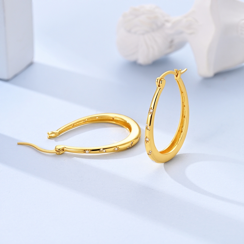 Women's Golden Drop-Shaped Star Earrings in 925 Silver