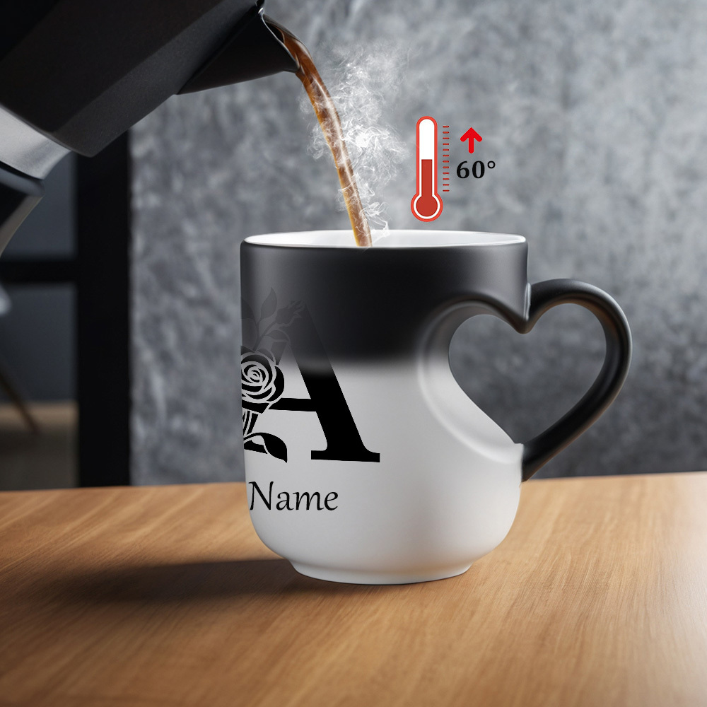 One Custom 11Oz Mug Featuring a Personalized Name And Floral Letter Design That Changes Color with Hot Water: an Ideal Present for Loved Ones - Heart-Shaped Ceramic Cup - Perfect for Halloween, Thanksgiving, And Christmas.