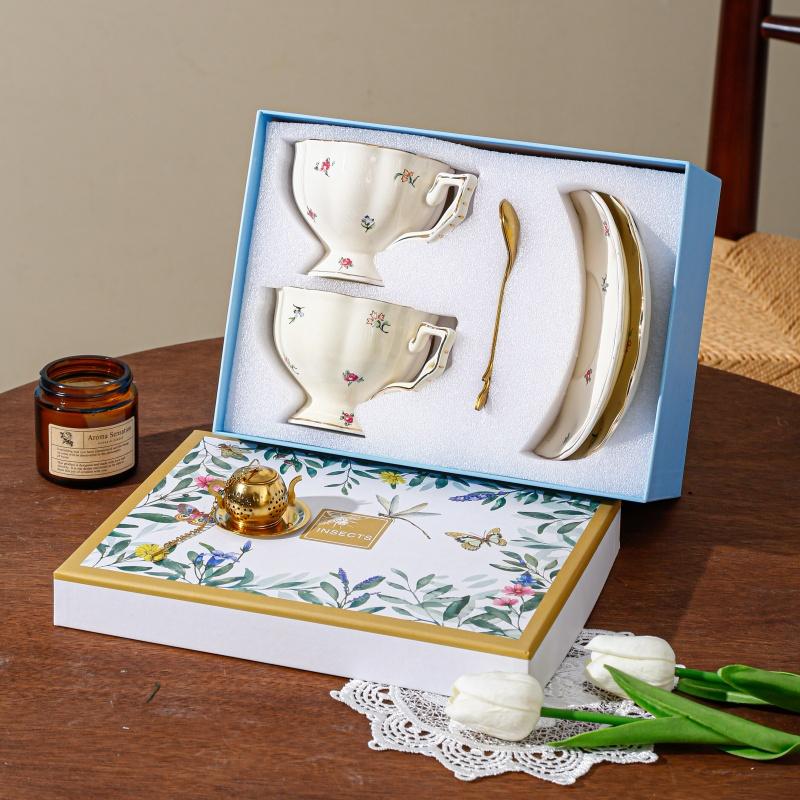 Set of 2 (One Cup, One Plate) And Set of 7 (Two Cups, Two Spoons, Two Pads, One Tea Strainer in a Gift Box). Ceramic Coffee Cups And Plates for Home Kitchens And Dining Rooms, Suitable for American Lattes, Coffee, Tea, And Water