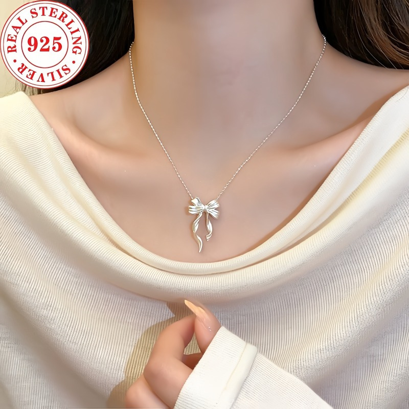 TEMU Un collier en argent pur S925, avec soin, d'un nœud en ruban brossé, offrant un style unique et , parfait pour un cadeau de Noël élégant et .