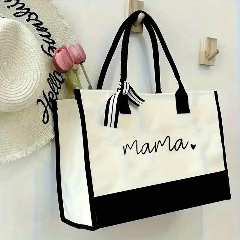 Image of Large Capacity "mama" Tote Bag With A Detachable Ribbon - For Mothers, Suitable For Travel, Work, Shopping, And Storage - Designed In White And Black