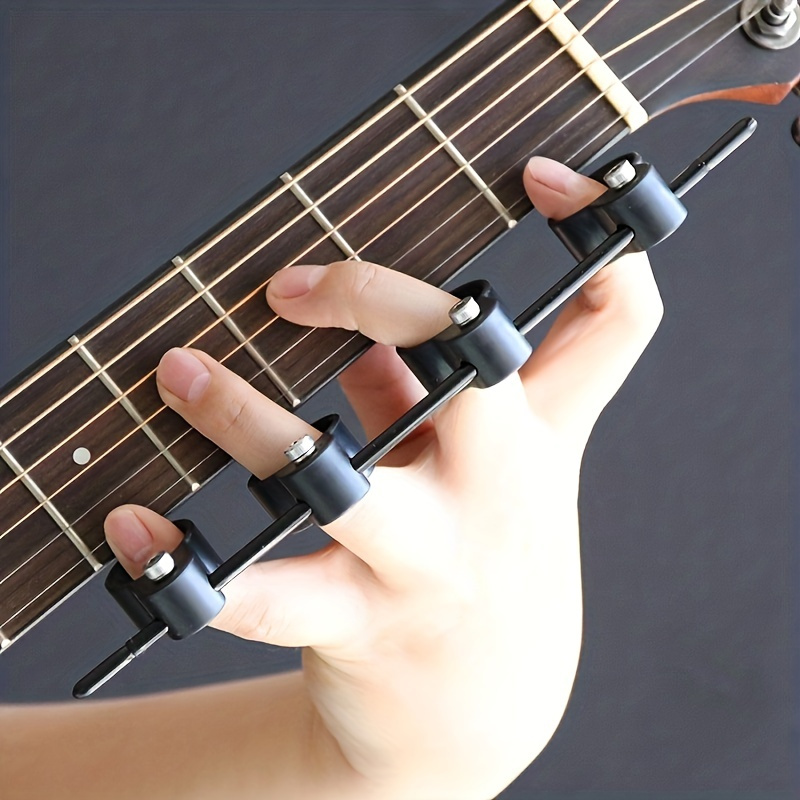 

1pc Black Guitar And Finger Strengthener - Adjustable Abs Finger Spacer For And - Instrument Accessory For Skill Improvement And Fatigue Reduction