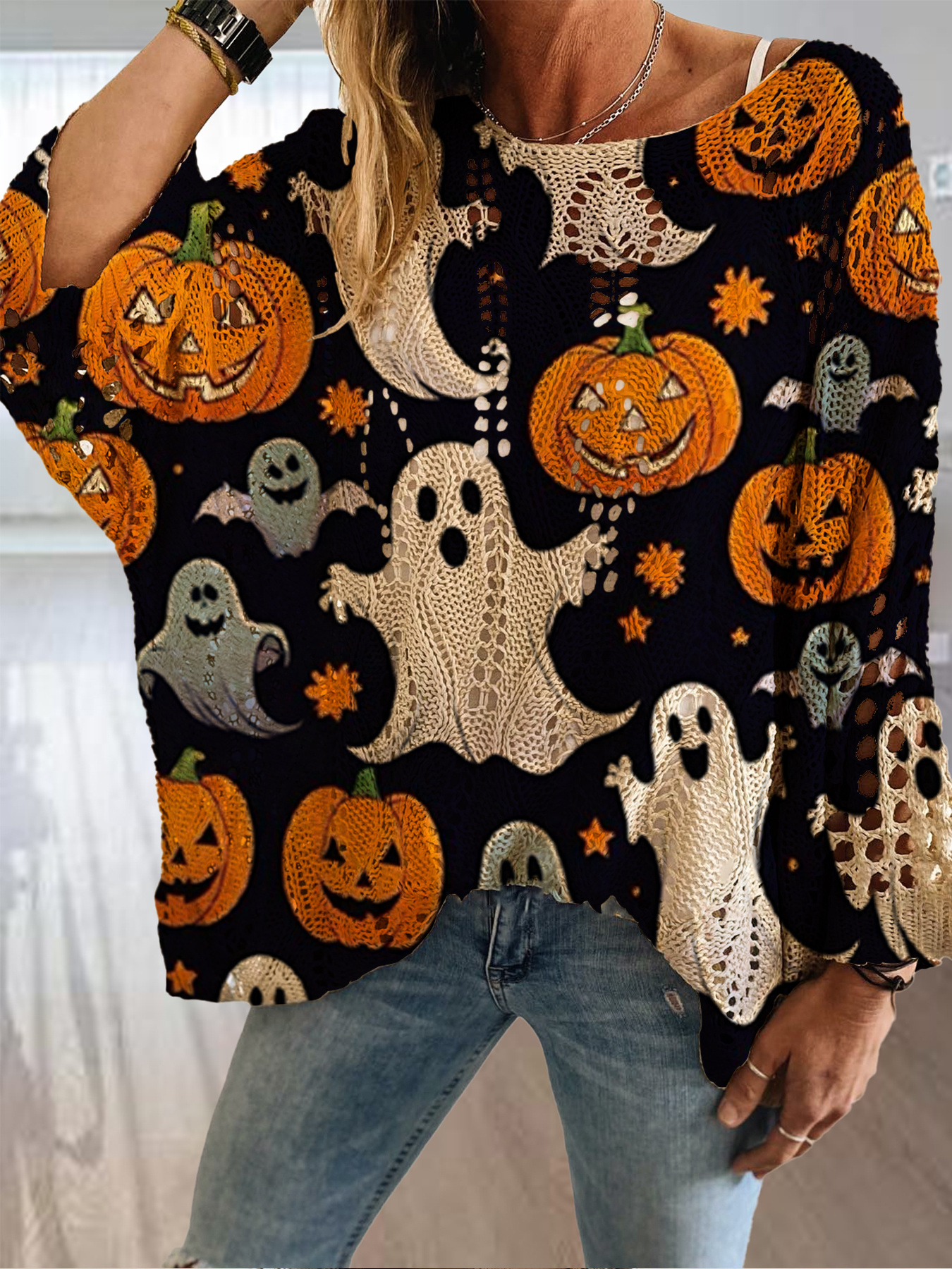 item picture halloween style womens sweater round neckline diamond shaped cutouts bat shaped sleeves top with skull and pumpkin prints loose fit shoulder sliding design that   to   the figure suitable for use as an outer layer over bikinis