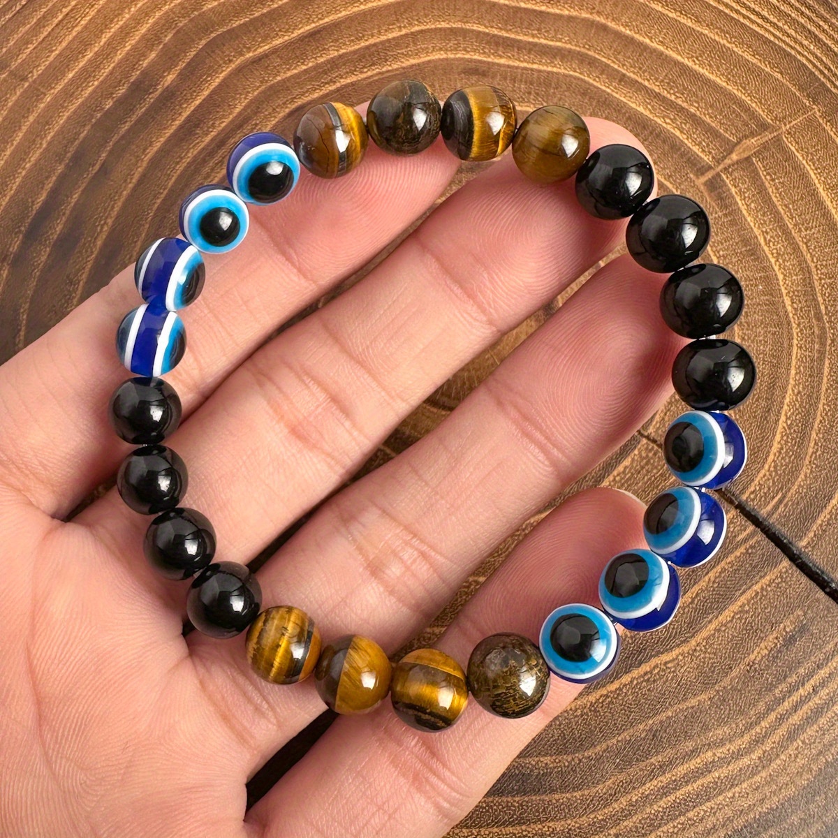handmade tiger eye obsidian evil eye bracelet blue accents