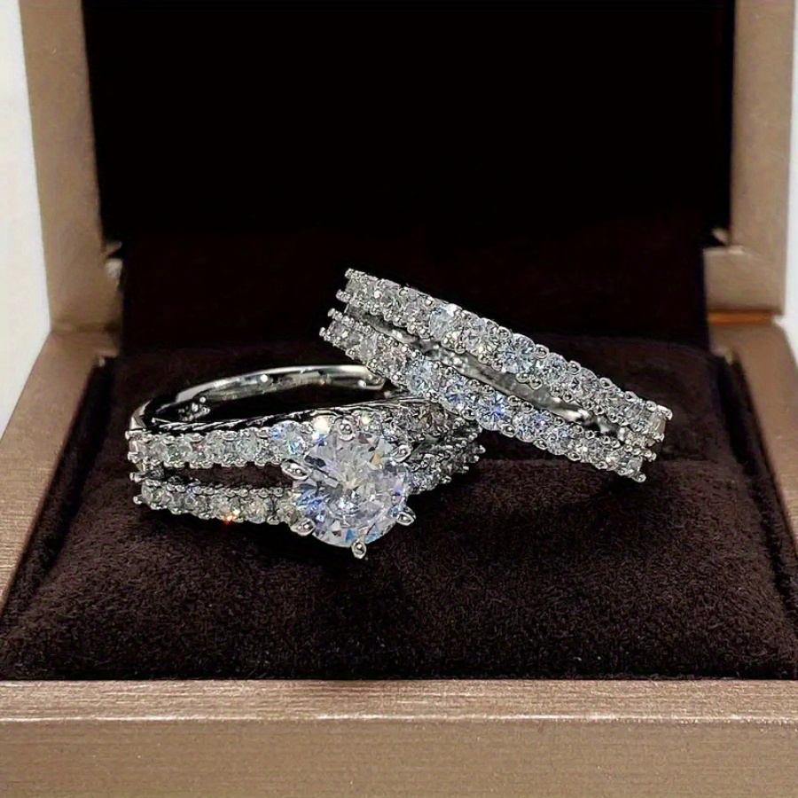 A Set Two Stylish Sparkling Engagement Rings