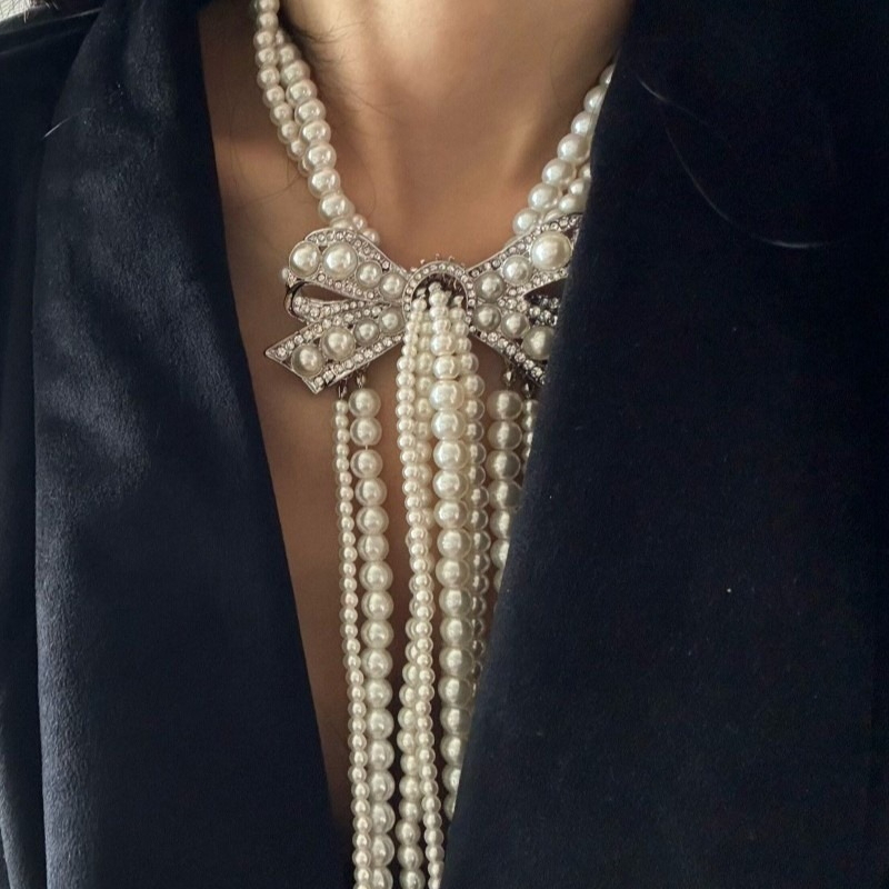 Multi-Strand Pearl Bow Statement Necklace