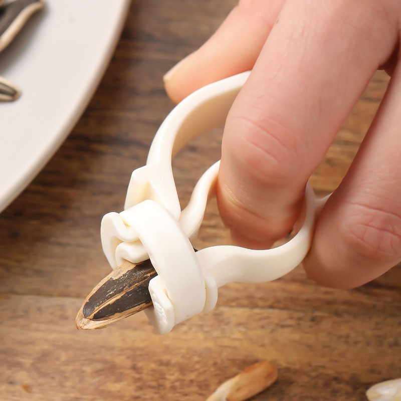 peeling melon seed shell artifact lazy person         and quickly  
