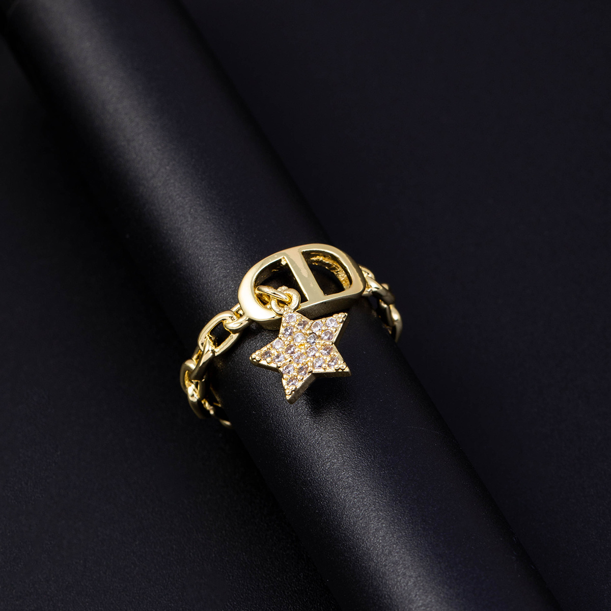 an elegant and luxurious ring for women featuring a   shaped copper setting with synthetic zirconia   everyday wear and holiday gifting