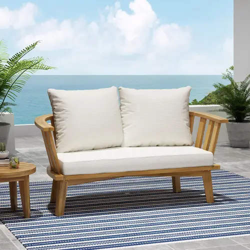 outdoor wooden loveseat with cushions 55 50 w x 27 00 d x 25 50 h