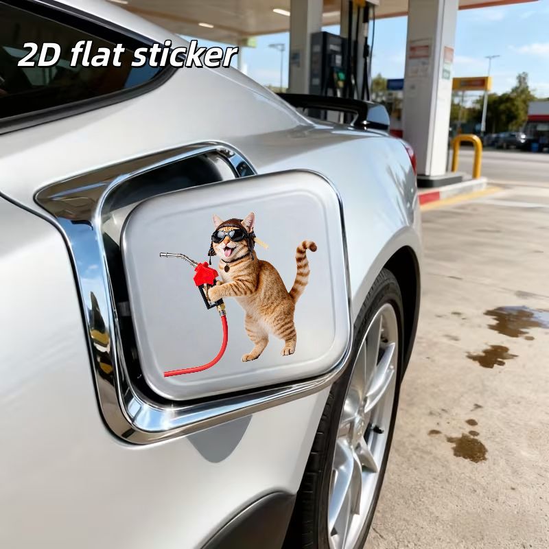 2d Flat - A Single Tan And White Striped Cat Wearing A Brown Helmet And Black Goggles, Grasping A Red Fuel Pump Nozzle - A Flat 2d Sticker, Suitable For A Car Fuel Tank Cap Or As A Car Decal