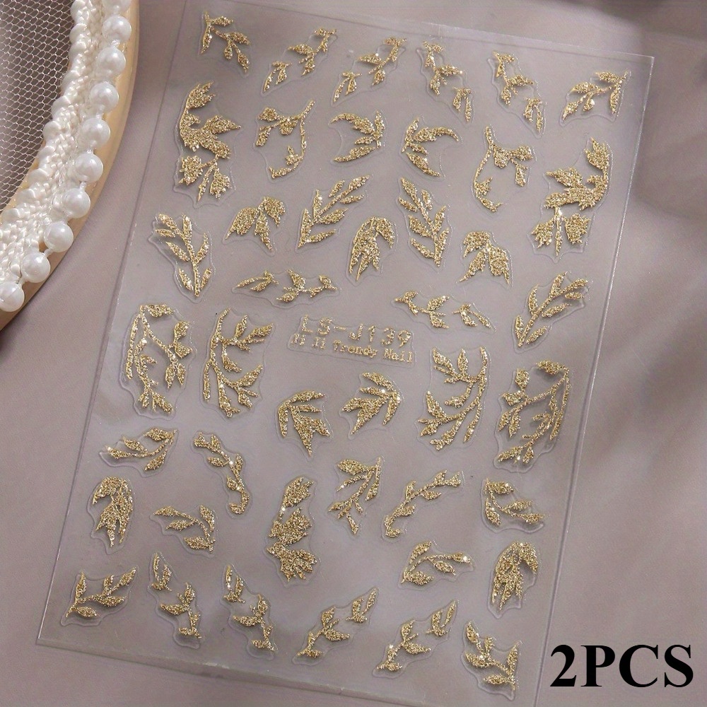 2 Sheets Of Shiny Golden Glitter Leaf Nail Art Stickers Featuring A Shimmering Leaf Design, Perfect For Self-adhesive Nail Decorations And Nail Art