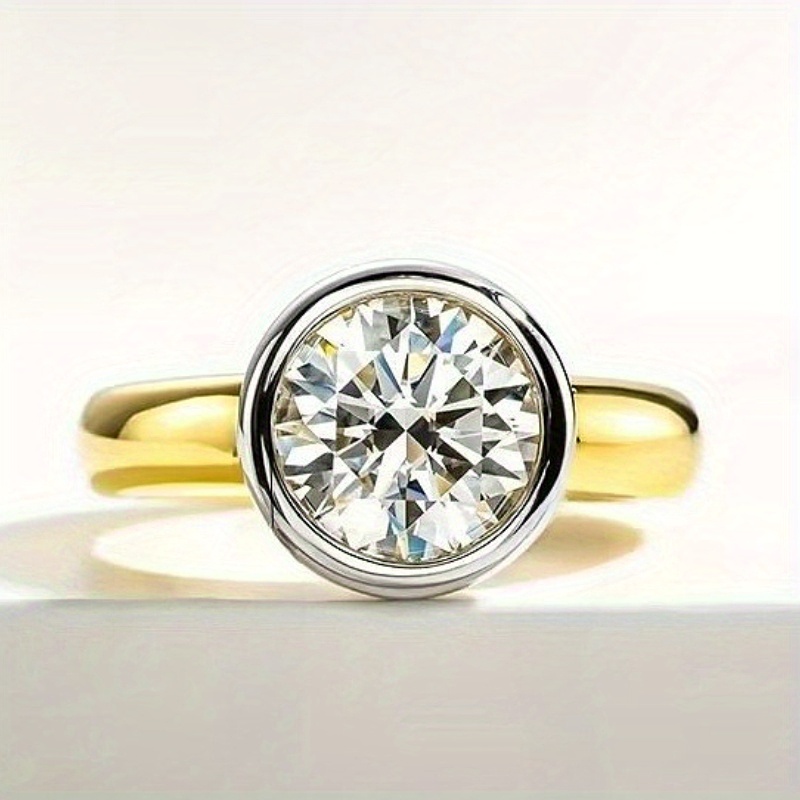 Image of A 14k Gold-plated 925 Silver Ring Featuring 1, 2, Or 3 Carats Of Round And Baguette Moissanite, Designed For Men And Women. This High-quality Wedding Is Easy Yet Elegant