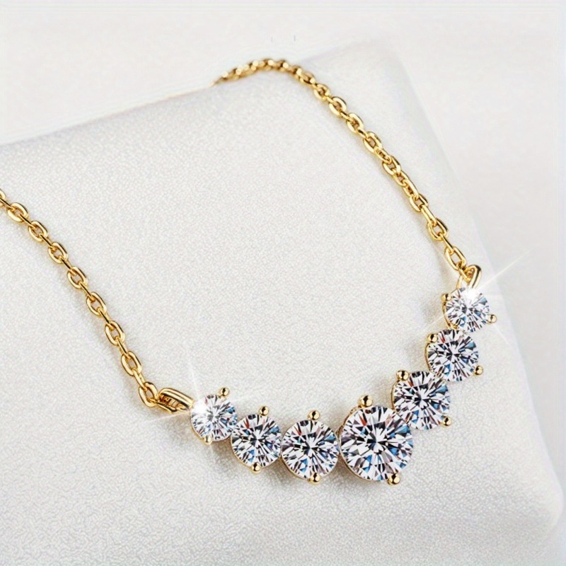 Image of A Stylish Unisex Pendant Necklace Featuring A Round Moissanite Design, From 14k Golden Plating. This High-quality Piece Combines A Trendy And Versatile Aesthetic With A Easy Yet Classic Look
