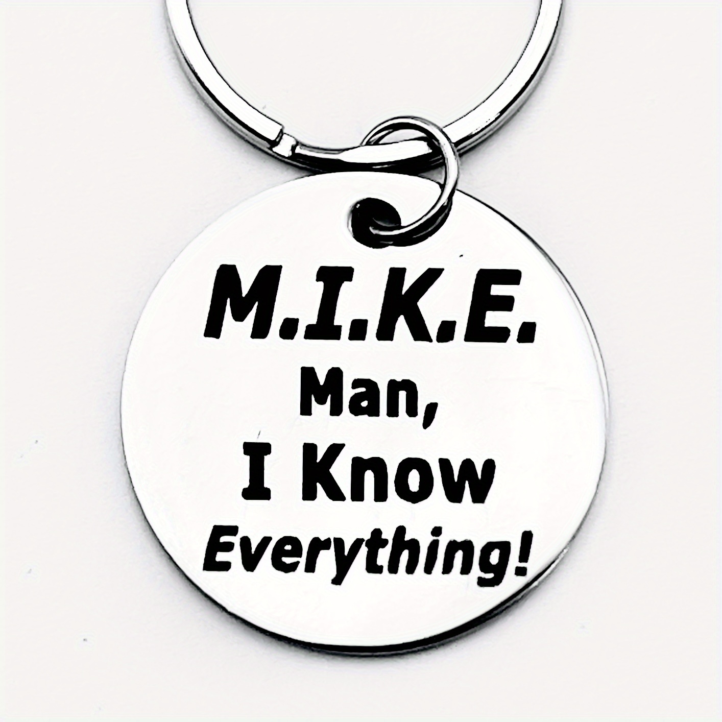 

A Humorous Steel Keychain With The Inscription .e. , A And Personalized For , A Fun