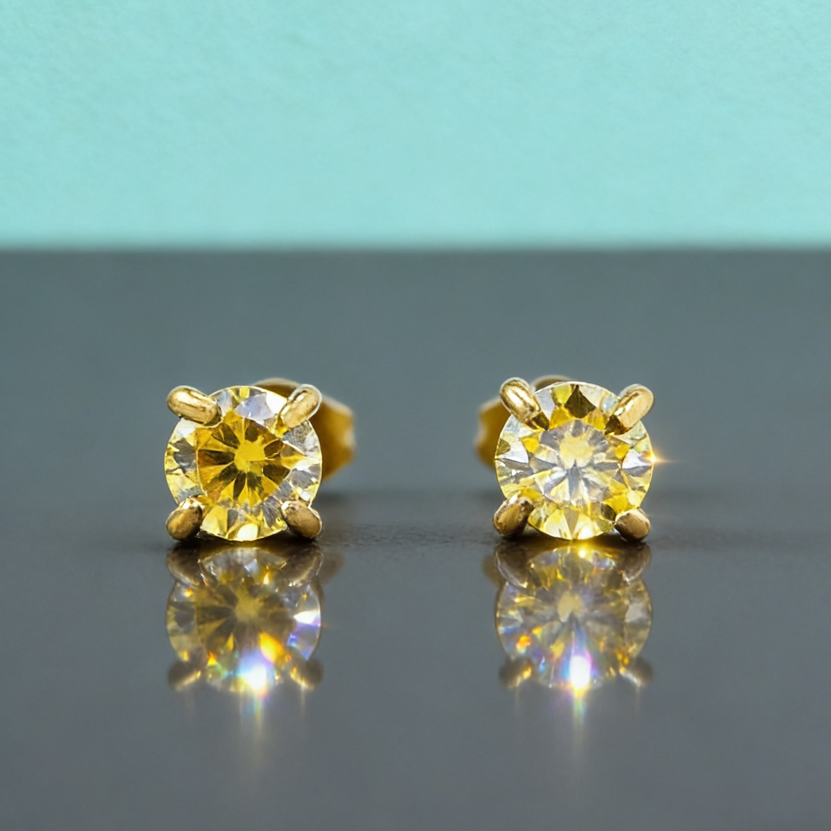 Chic Round Cut Moissanite Four-Prong Golden Stud Earrings