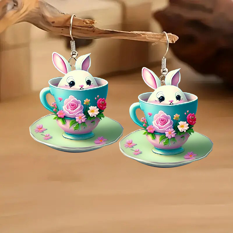 

A Pair Of Cute 2d Acrylic Bunny Earrings With Stainless Steel Hooks, Featuring A Shy Rabbit Hiding In A Flower-filled Teacup, Perfect As An Easter Gift, Suitable For Women's Seasonal Fashion Earrings.