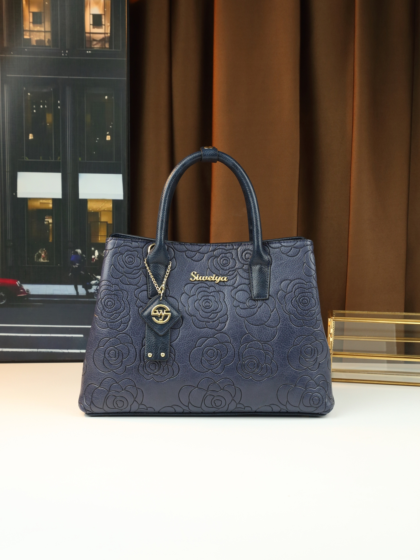 Thought Yaa Handbag on model shoulder