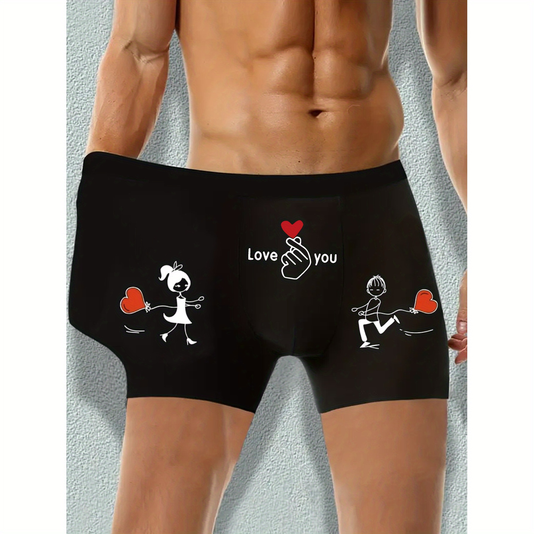 

A Pair Of Men's Boxer Shorts With A Love Pattern And Letter Print, Made Of Thin, Breathable Fabric For , Featuring Stretchy Athletic Shorts, Casual Underwear For Wear.