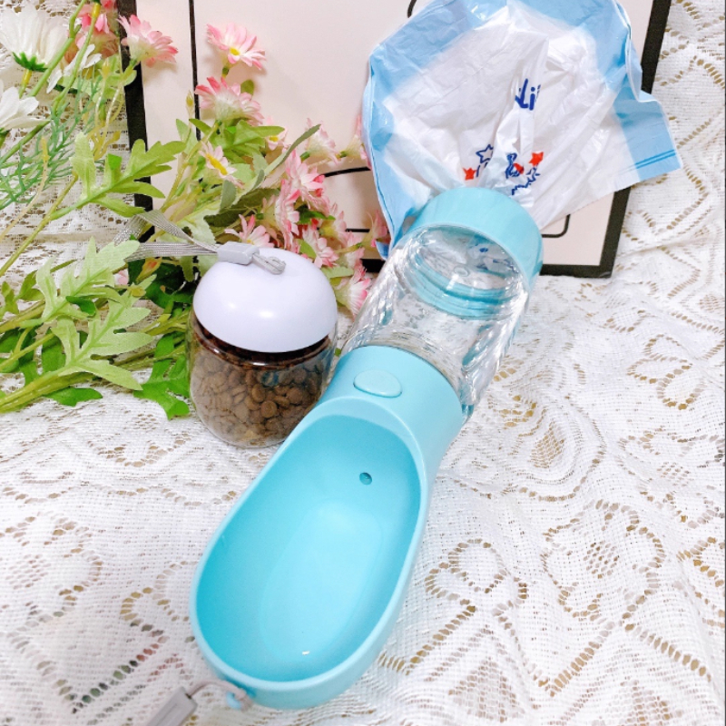 a portable outdoor pet water and food cup for walking dogs   in one outdoor pet water and food container a dog water bottle a dog treat bag a pet   dog snacks pet lunch dog food dispenser dog water dispenser dog feeder Product details 1