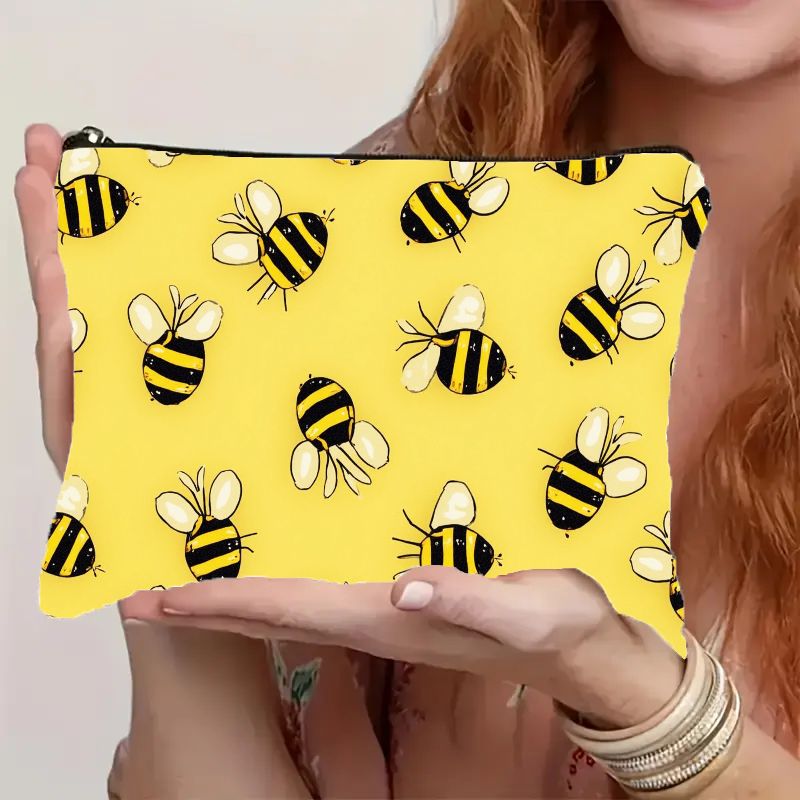 lightweight and portable makeup pouch featuring a cute cartoon     with a smooth zipper this durable cosmetic organizer is perfect for women and girls serving as a versatile travel toiletry bag for daily necessities and additions