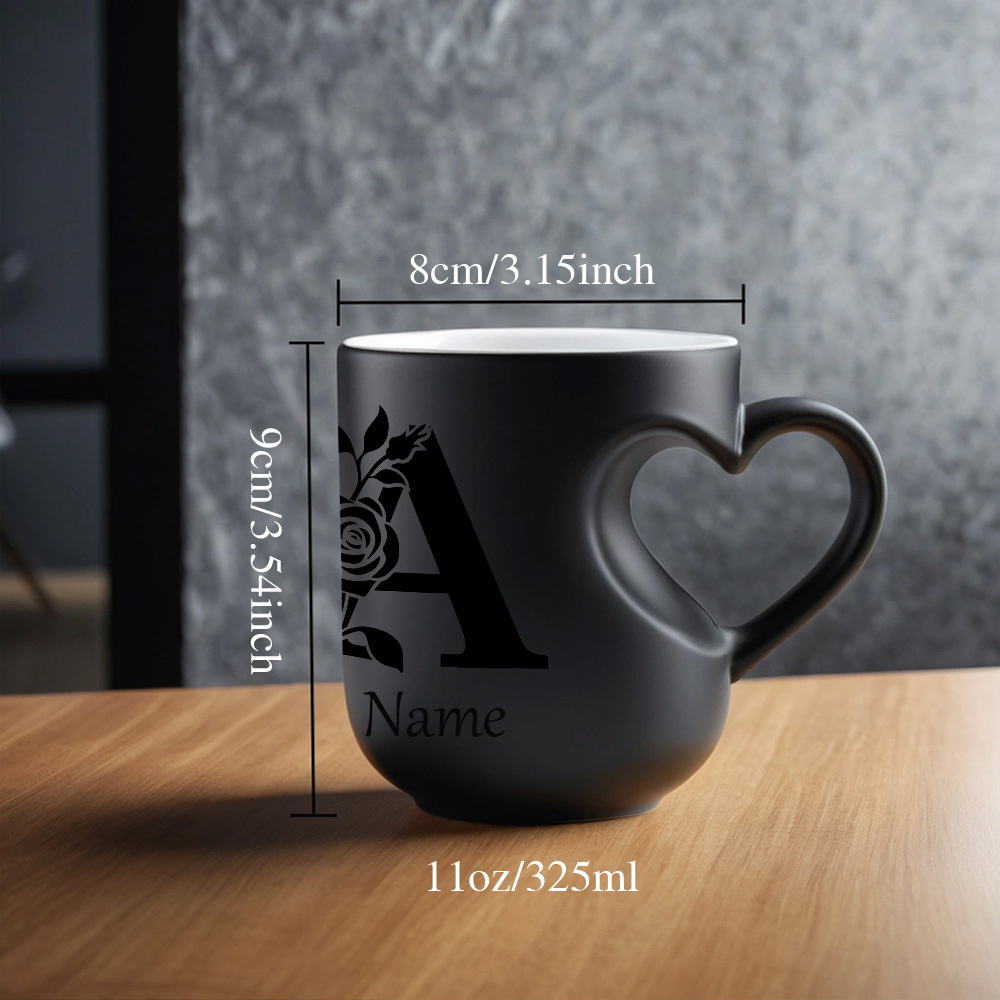 One Custom 11Oz Mug Featuring a Personalized Name And Floral Letter Design That Changes Color with Hot Water: an Ideal Present for Loved Ones - Heart-Shaped Ceramic Cup - Perfect for Halloween, Thanksgiving, And Christmas.