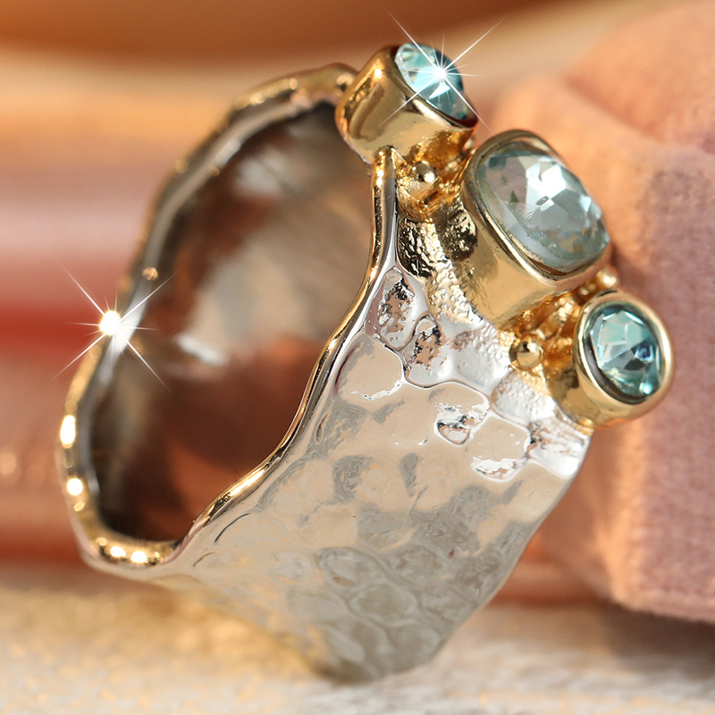 Women's Irregular Hammer Pattern Wide Face Ring with Blue Zirconia