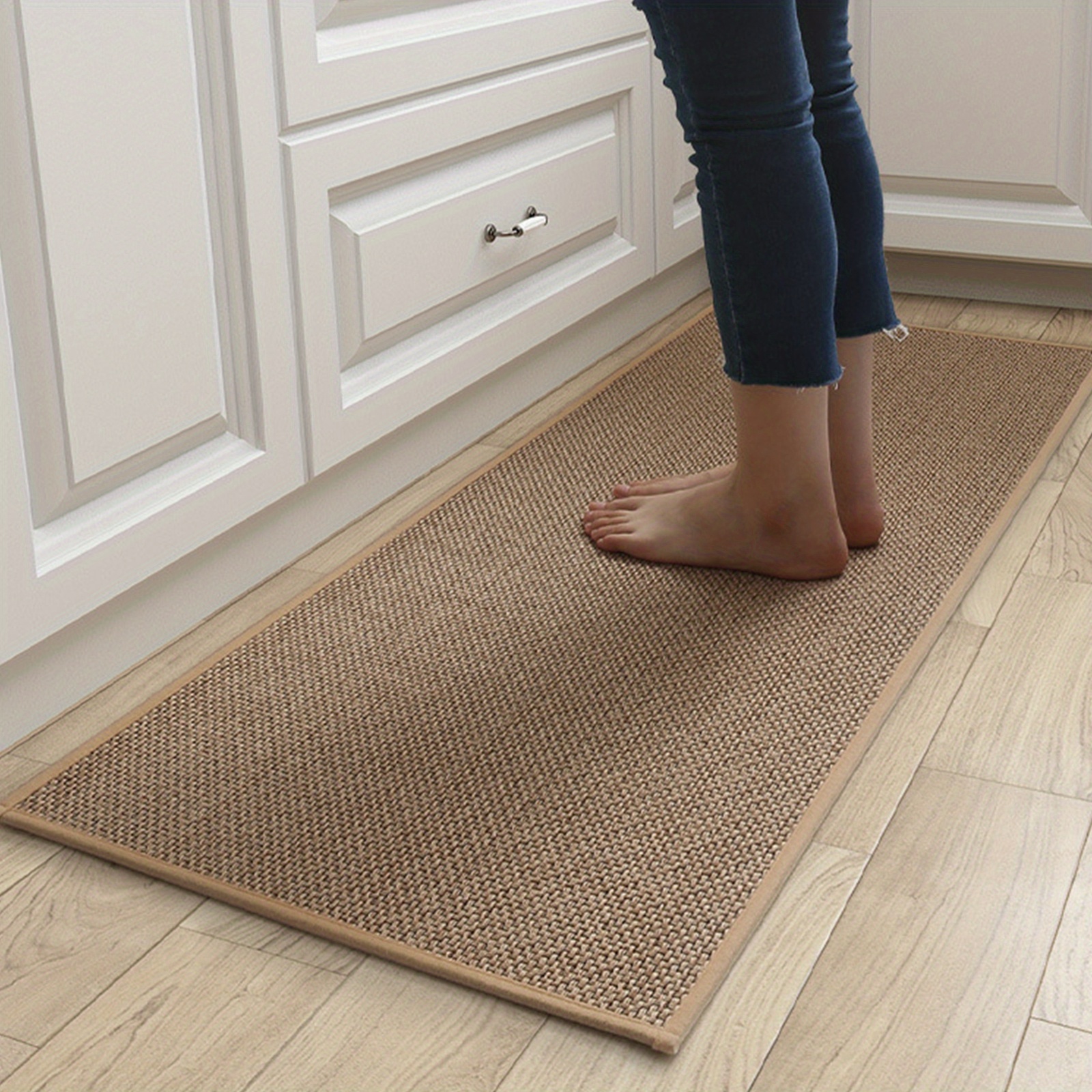 Set of 2 non-slip beige kitchen rugs and runner in a modern kitchen