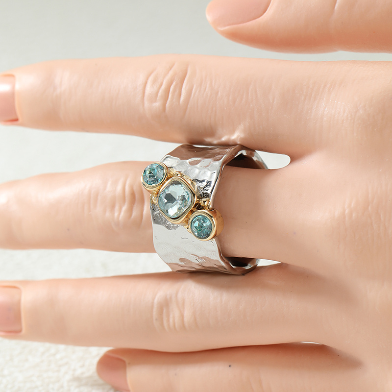 Women's Irregular Hammer Pattern Wide Face Ring with Blue Zirconia