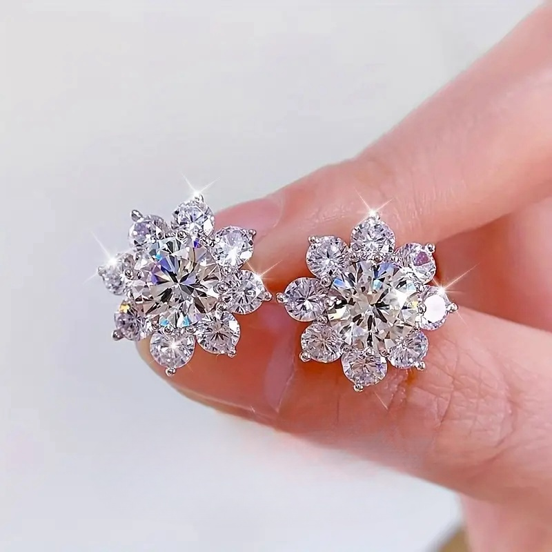 

Pair Of Stylish Small Earrings For Women, Featuring Artificial Zirconia Sunflower Studs, Perfect For , Parties, Vacations, Anniversaries, And Gifts.