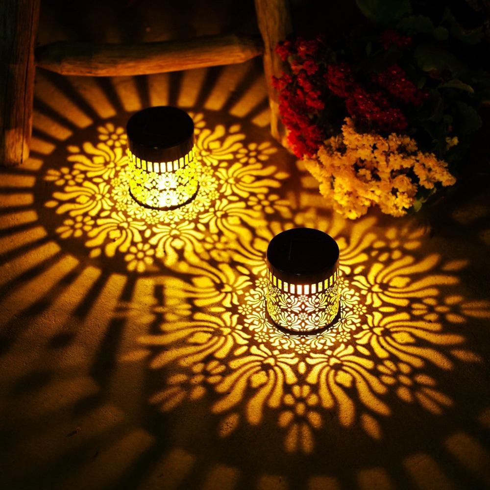 Image of 2pcs Hollow Flower Projection Solar Lights, Metal Solar Hanging Lights, Decorative Shadow Projection Lamps, Perfect For Garden, Patio, Courtyard, Or Outdoor Party Decor