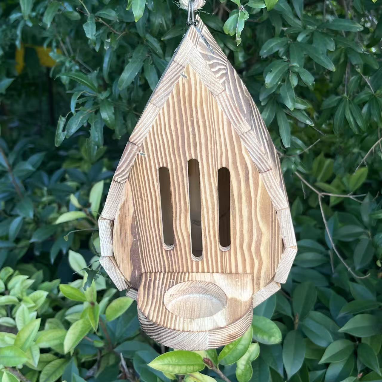 Image of A Habitat For Butterflies And Moths Featuring A House And Feeder, Complete With A . It Has A Hanging Design And Is Easy To Clean Thanks To A , Providing Outdoor Shelter