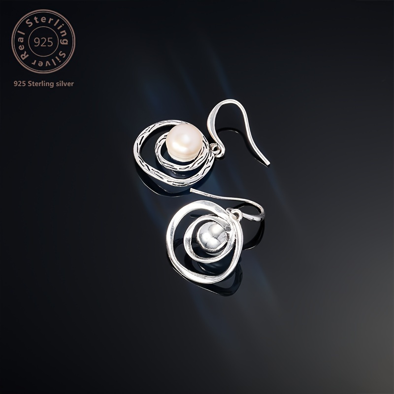 pair of exquisite multi layered swirl pearl earrings traditional carved   three dimensional pattern natural     luxury attractive   suitable for weddings banquets parties   with a   box Product details 3