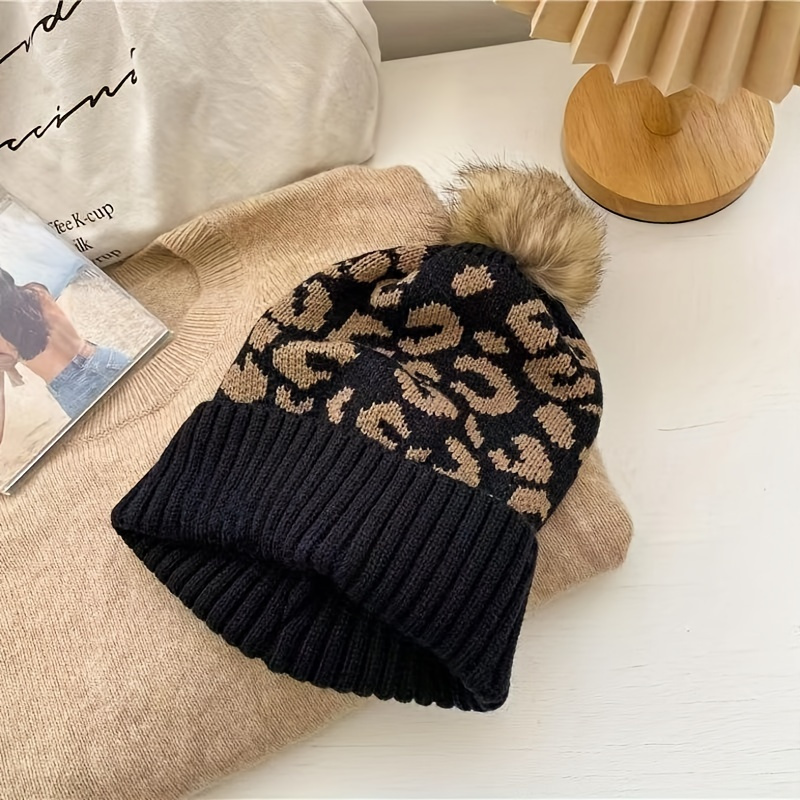 Image of Stylish Cap With Leopard Print And Pom-pom For Women, Made From . An For Christmas And Casual
