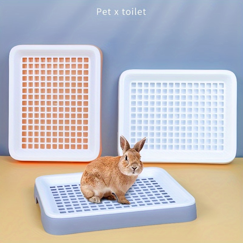 

A Plastic Rabbit Litter Tray - Easy To Clean, With A Grid Pattern, Suitable For , Birds, And | Includes An Orange Training Cage Lid