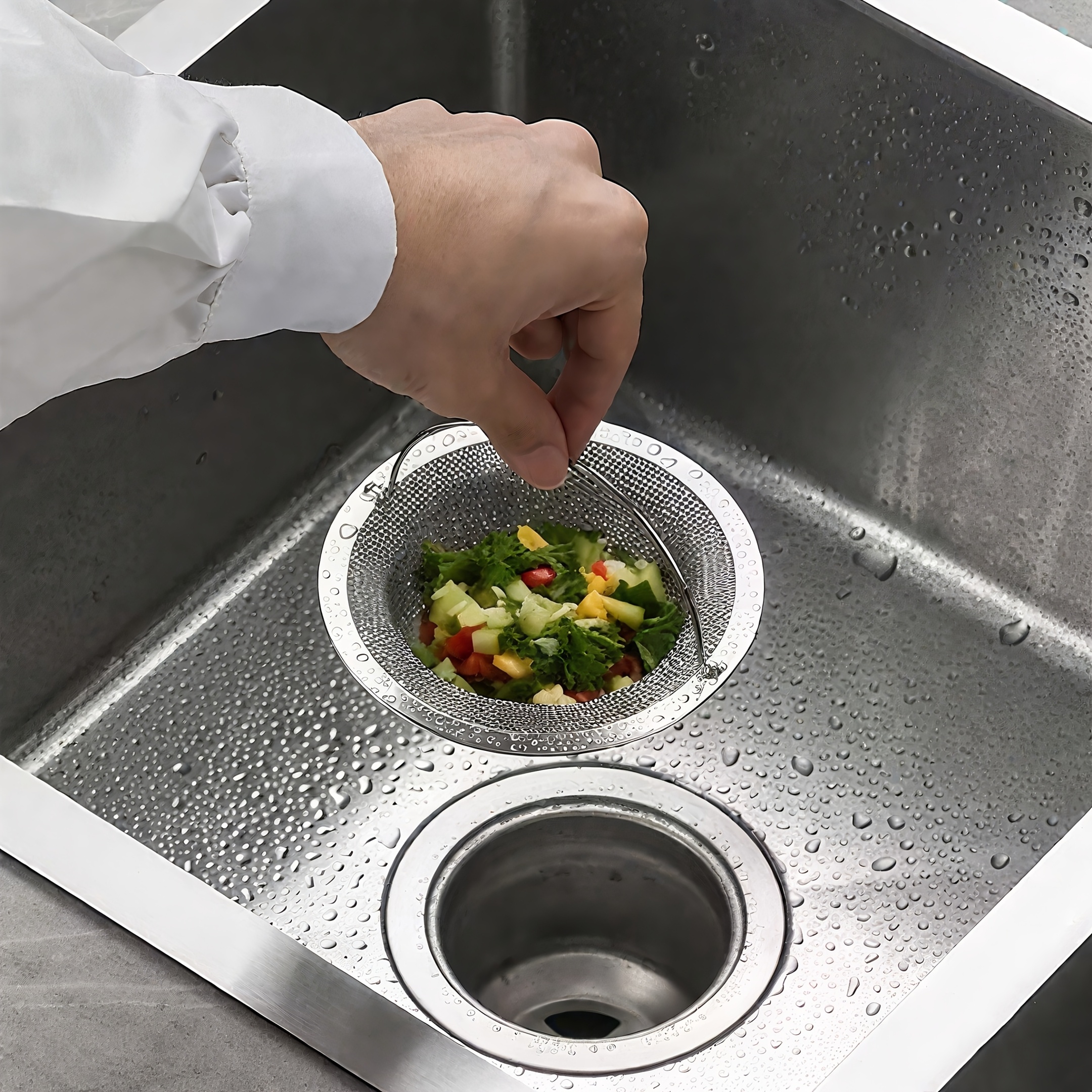 Juego de filtros para fregadero de acero inoxidable con múltiples capas de malla fina que intercepta eficazmente el pelo, restos de comida y otros desechos. Es adecuado para salidas de desagüe de cocina y baño y es un accesorio práctico y esencial para prevenir obstrucciones en las tuberías