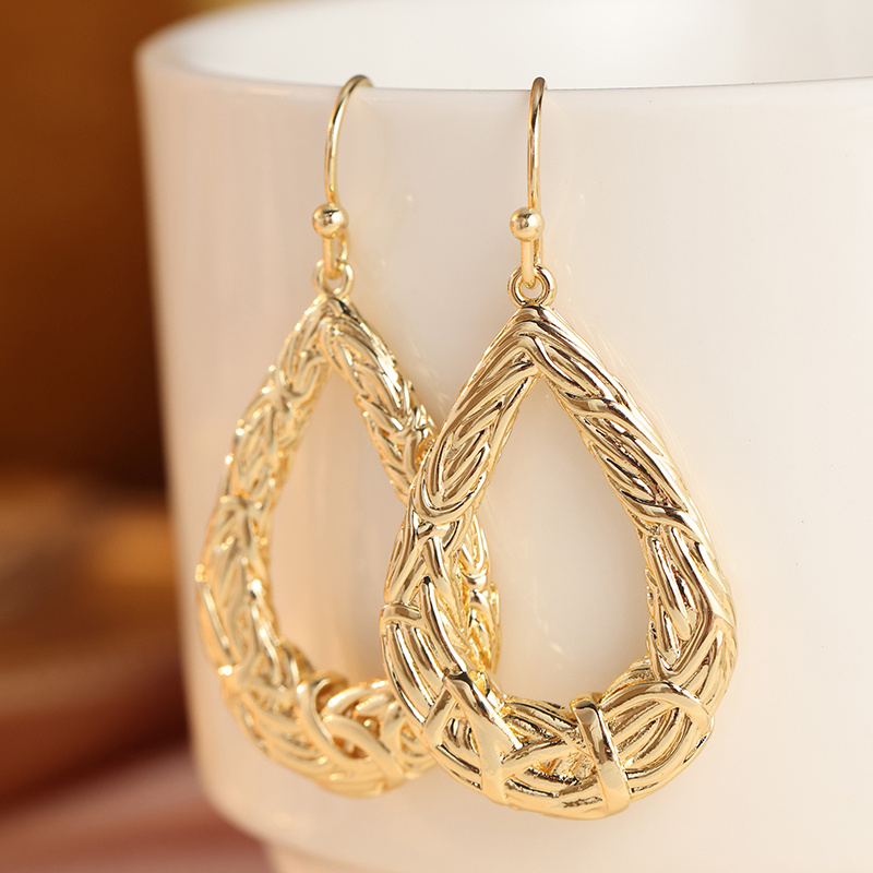 Women's Retro Bohemian Hollow Woven Twisted Earrings