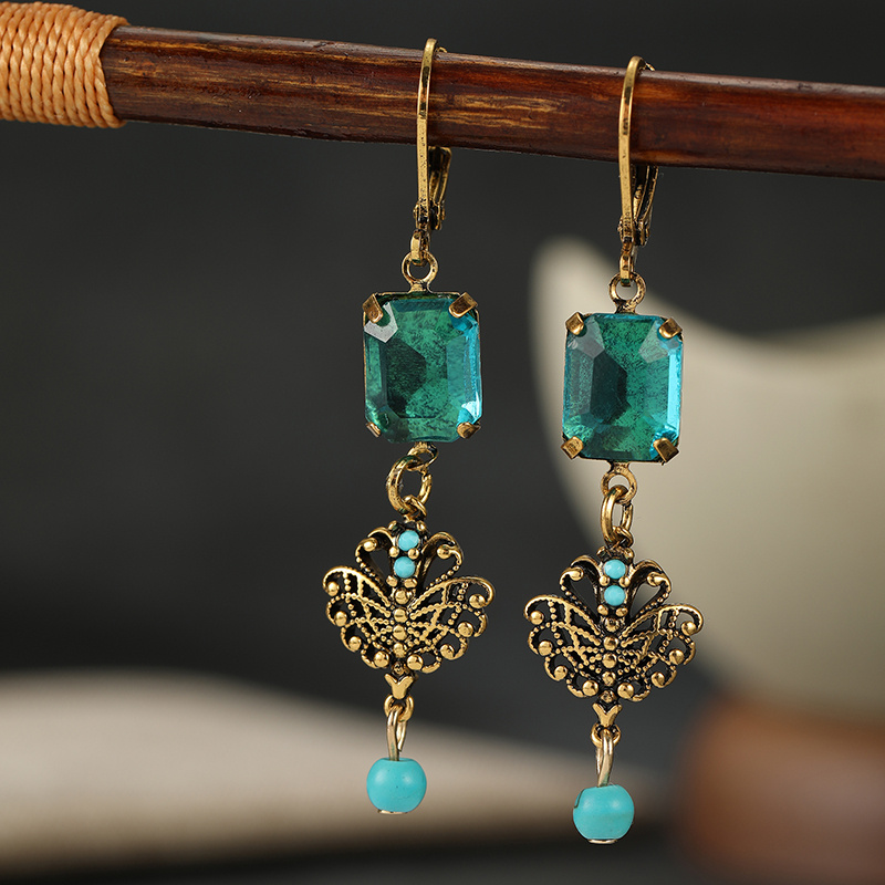 TEMU Pendientes colgantes para mujer con incrustaciones étnicas de circonita cúbica azul , color dorado moderno, tallado a , uso diario, joyería para