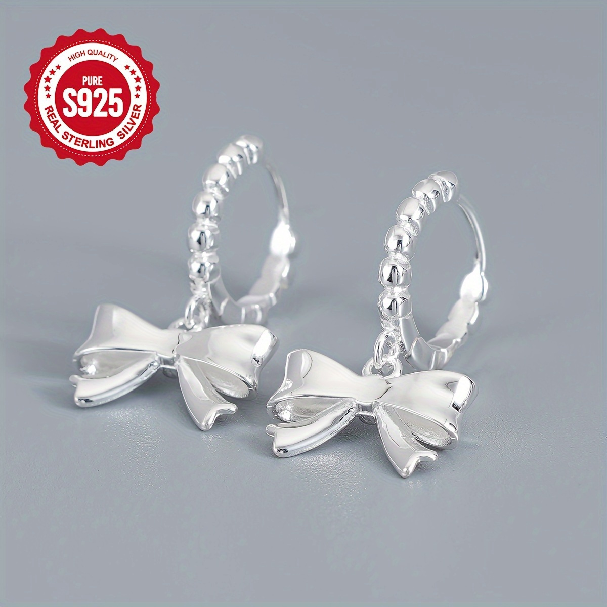 

A Pair Of Pure Silver 925 Bow Earrings: A Pair Of 3.95g 925 Pendant Earrings, Suitable For