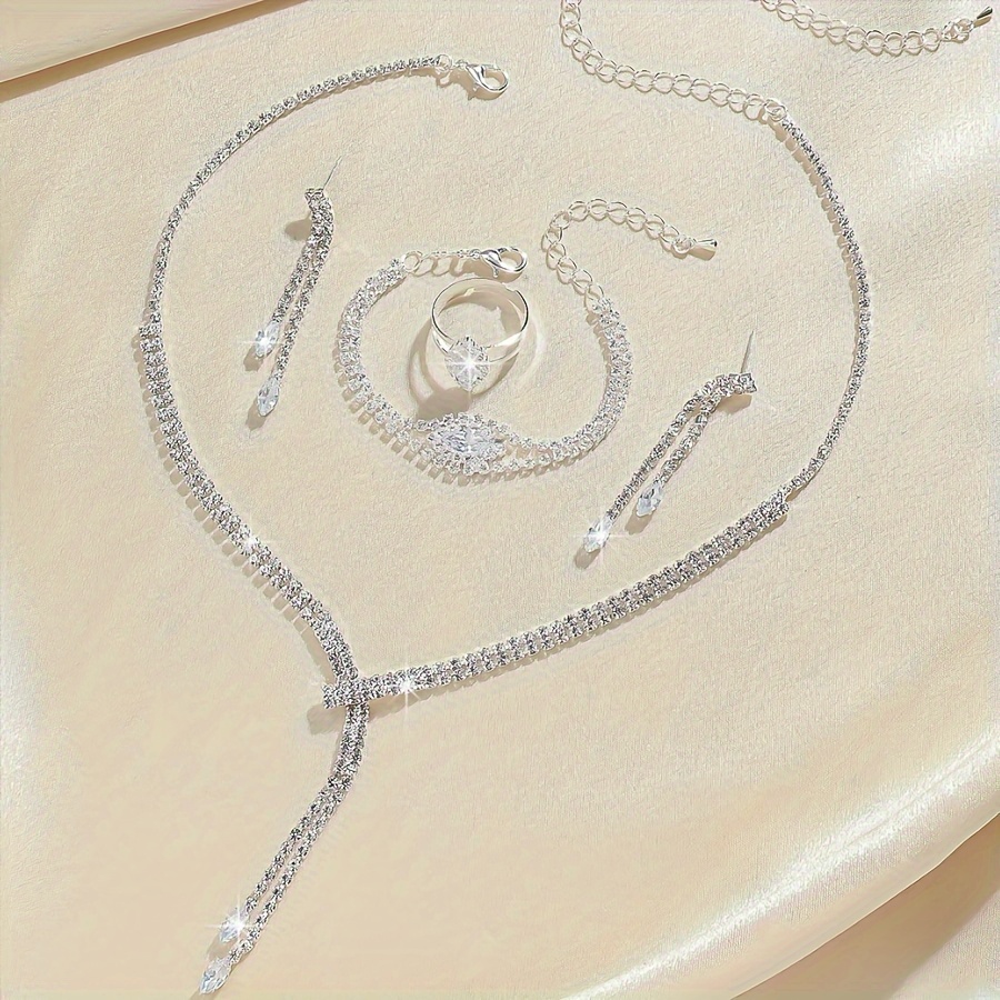 E-shop [Elegantes Tränen-Schmuckset] Ein elegantes Schmuckset mit 1 Paar Ohrringen, einer Halskette, einem Armband einem Ring, versilbert mit
