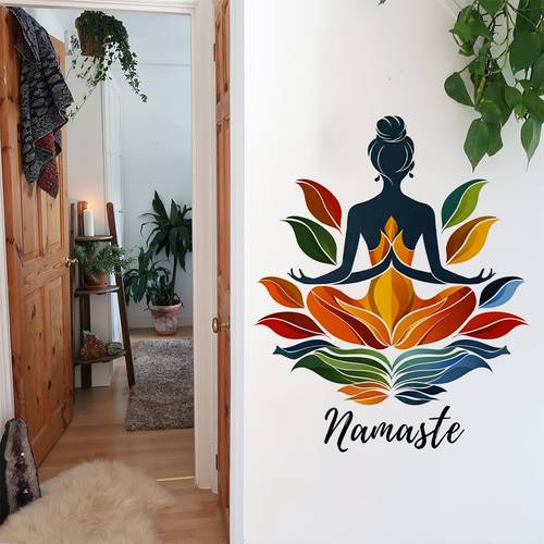 a wall sticker featuring a silhouette of a woman meditating with lotus flower and the quote this decor is perfect for a zen meditation space and repositioned