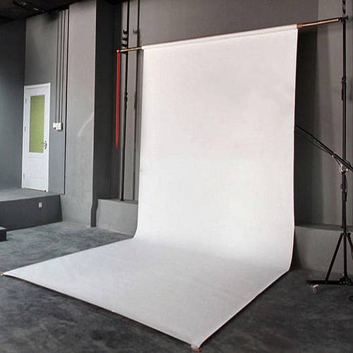 white vinyl backdrop cloth for photography measuring 3 feet by 5 feet or 90 cm by 150 cm suitable for studio backgrounds at parties