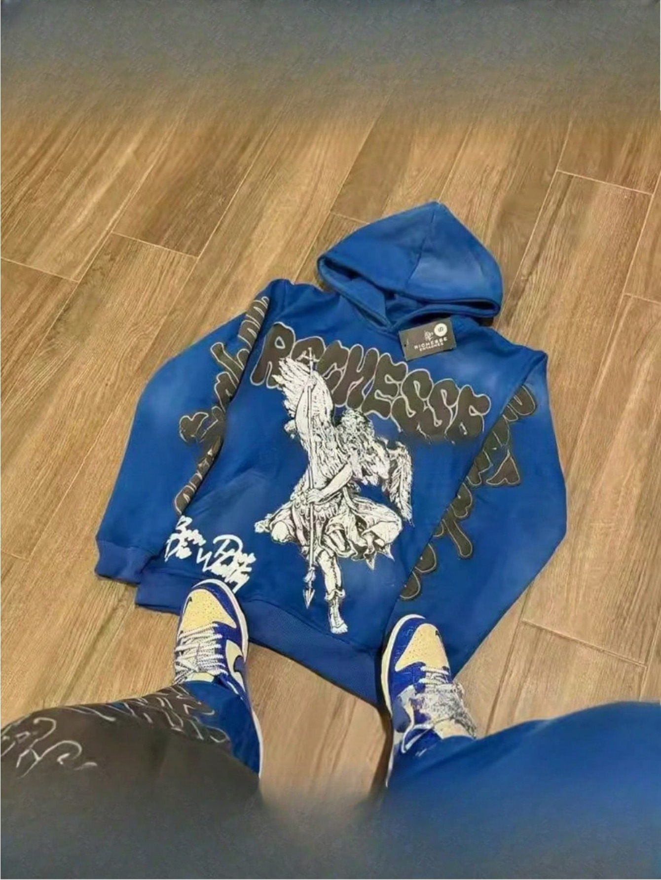 blue graphic hoodie sold on Temu United States