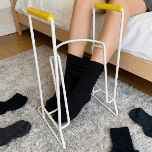 tool for putting on and compression socks its adaptive structure conforms to of your feet eliminating the need to to hold the sock opening it reduces and putting on and