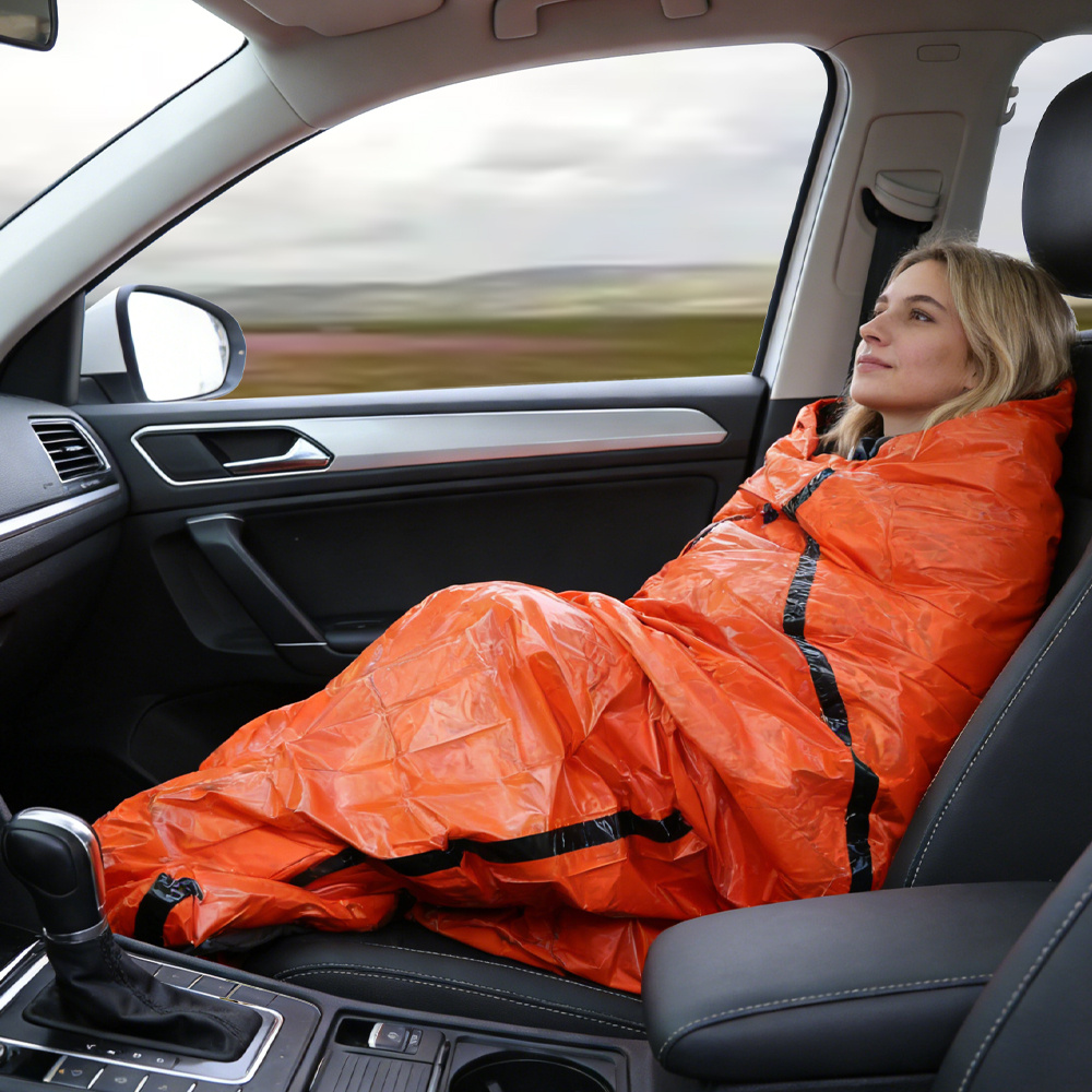 Emergency bivvy sleeping bag in outdoor use